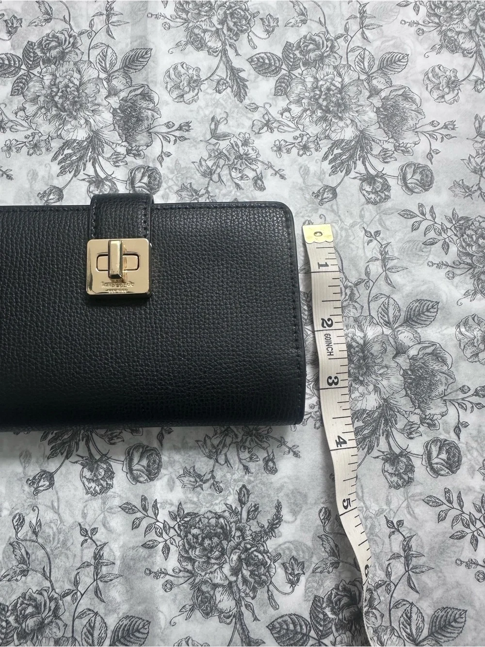 kate spade Black Pebbled Leather Continental Wallet with Gold Logo
